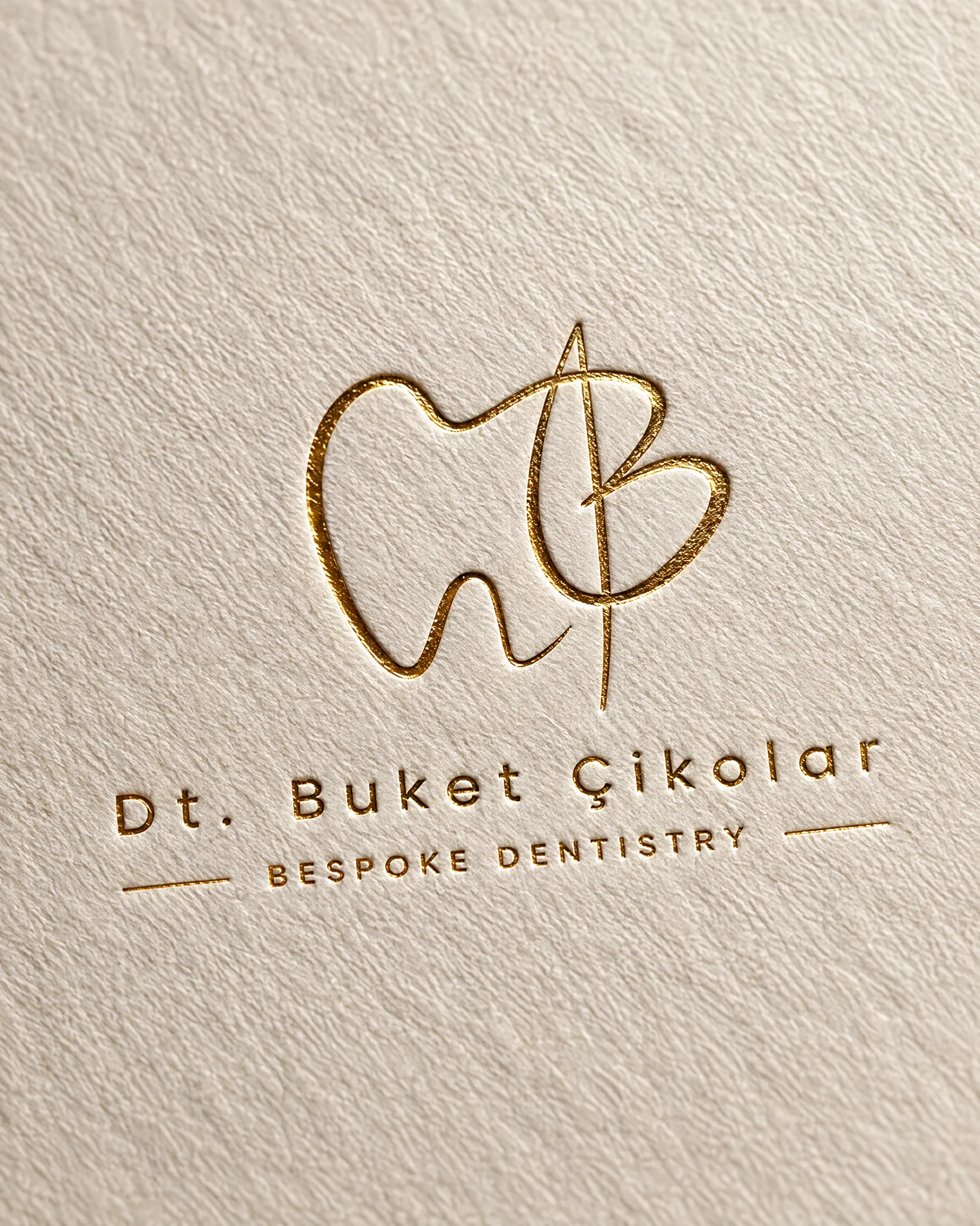 Kör kabartma ve altın varak — logo kağıtta